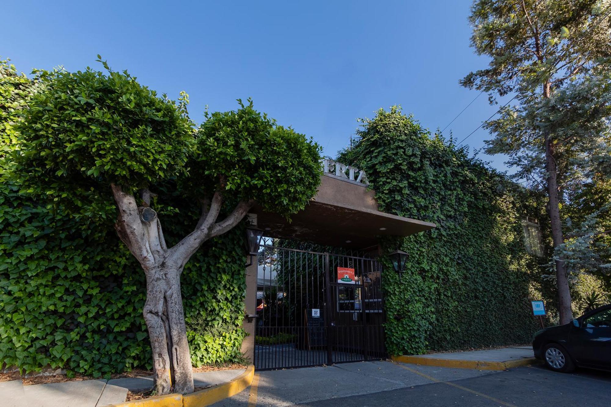 Capital O La Huerta Golf & Hotel チョルーラ エクステリア 写真