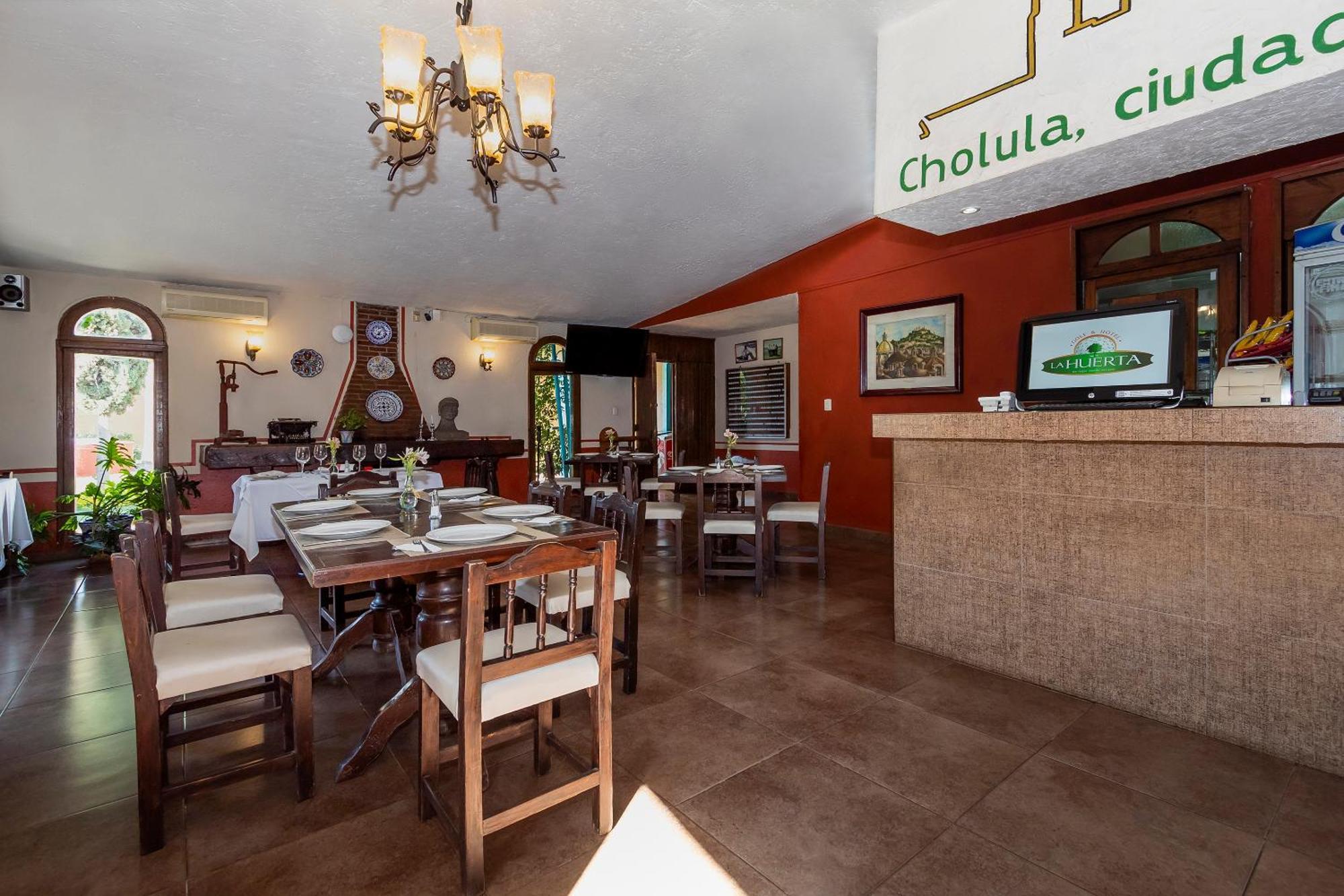 Capital O La Huerta Golf & Hotel チョルーラ エクステリア 写真