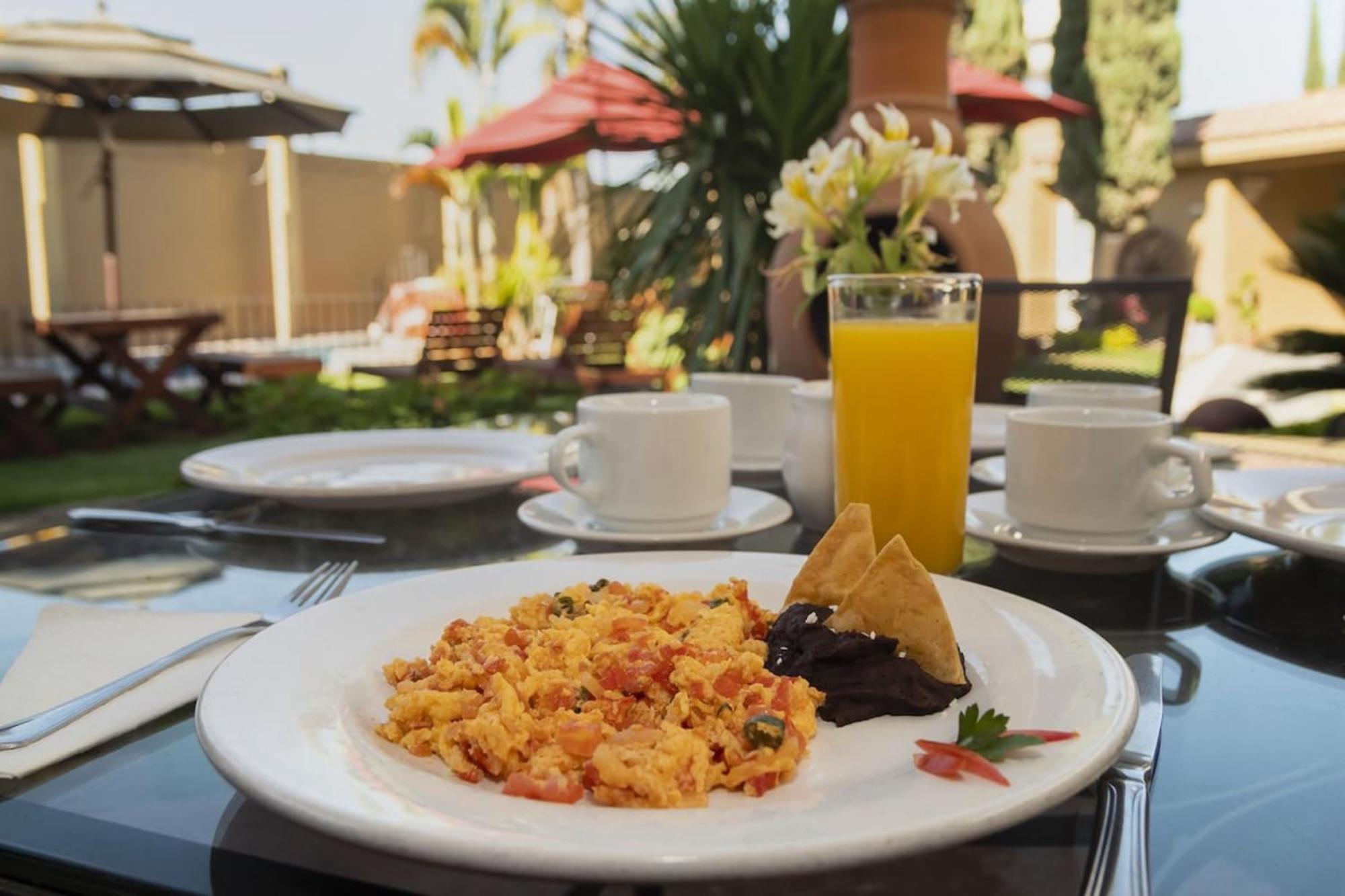 Capital O La Huerta Golf & Hotel チョルーラ エクステリア 写真