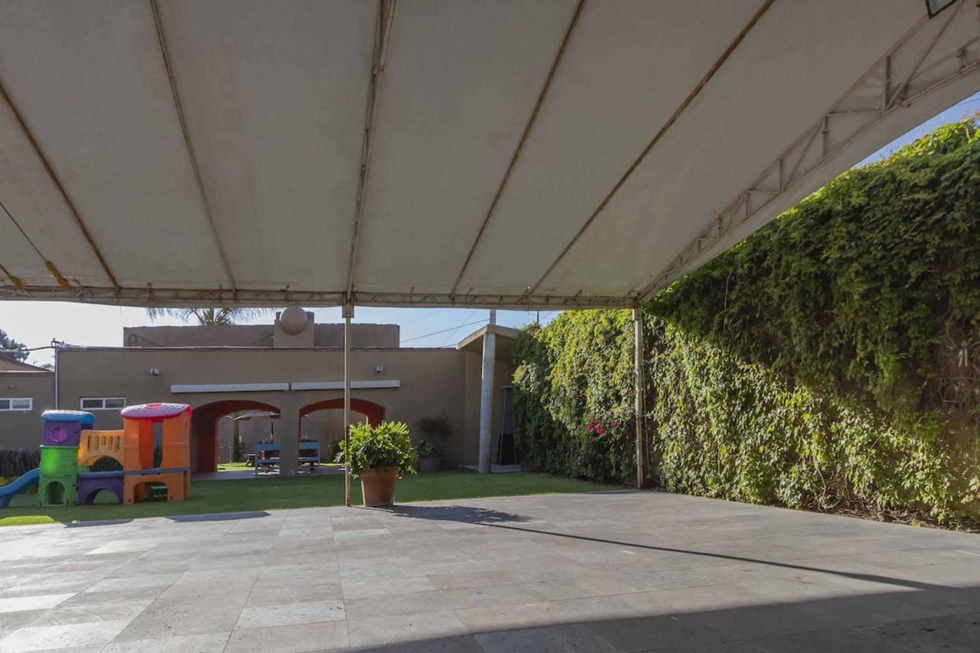 Capital O La Huerta Golf & Hotel チョルーラ エクステリア 写真